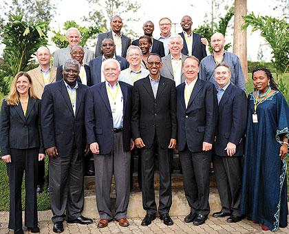 President Kagame (C) with members of the PAC yesterday. The New Times / Village Urugwiro.