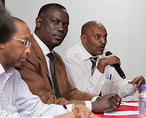 (R-L) Remy Mugunga, chair TAC Rwanda, Innocent Ntabana of the  Regional Agriculture Trade and Production project, and Desire Nzayange Program Officer, NELSAP, at the meeting. The New Times / Timothy Kisambira