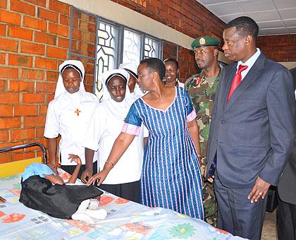 Ministers Aloysea Inyumba (C) and Gen. James Kabarebe (R) inspecting the facility at the launch of the Army Week yesterday. The New Times / Courtesy.