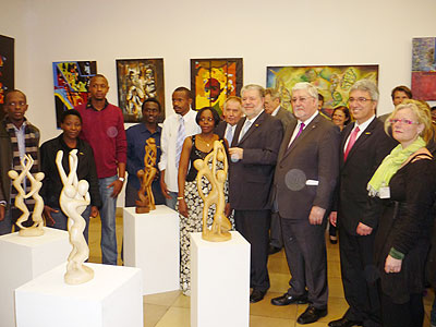 Rwandan artists pose for a group photo with dignitaries at the launch of the exhibition in  Germany. Courtesy photo.