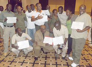 Some of the four guides celebrating after receiving their certificates upon completing  the training. The Sunday Times /  Grace Mugoya.