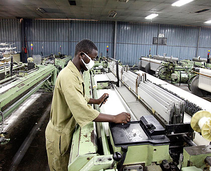 A worker at Utexrwa, yesterday. The Times / Timothy Kisambira.