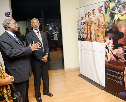 RPF Secretary General, Francois Ngarambe (R) with the visiting Secretary General of Tanzaniau2019s ruling Chama Cha Mapinduzi party, Wilson Mukama, tour the Kigali Genocide Memorial Centre yesterday. The New Times / J. Mbanda.