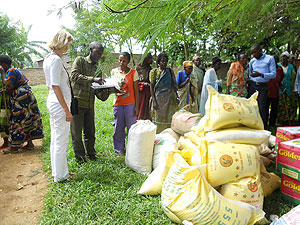 Zuzana Mruskovicova, the Financial Controller of NRD (left) prepares to hand over the donation. The New Times / Courtesy.