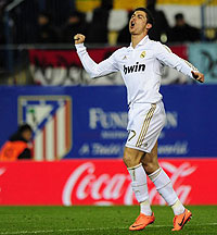 Cristiano Ronaldo celebrates after scoring his second goal during the match against Atletico Madrid. Net photo.