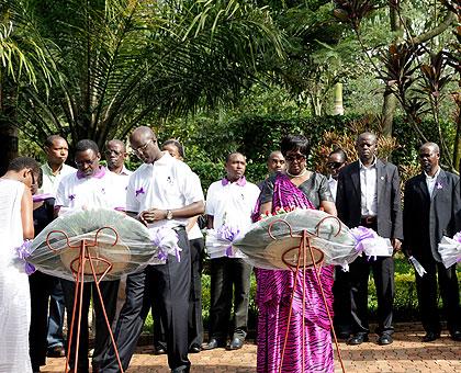 Health Minister Dr. Agnes Binagwaho (C) with her staff lays a wreath at Kigali Genocide Memorial centre in respect of Genocide victims. The Sunday Times/ T. Kisambira.