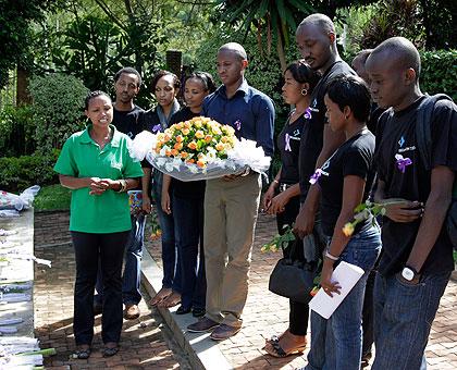 Staff of Pergamon Group honour Genocide victims at Kigali Genocide Memorial Centre. The Sunday Times / T. Kisambira.