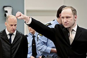 Breivik gave an apparent far-right salute as he entered the court on Monday morning. Net photo.