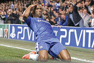 SLIDE RULE: Didier Drogba celebrates his goal. Net photo.