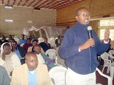 Groupe Scolaire des Parents de Butare Director, Gervais Biziramwabo, makes a point at the meeting. The New Times / JP Bucyensenge.