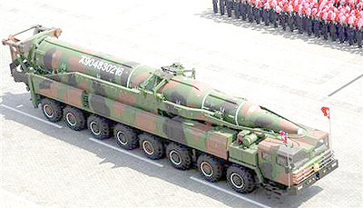 A rocket is carried by a military vehicle during a military parade to celebrate the centenary of the birth of Kim Il-sung in Pyongyang April 15, 2012 in this picture released by North Koreas KCNA on April 16, 2012. Net photo.