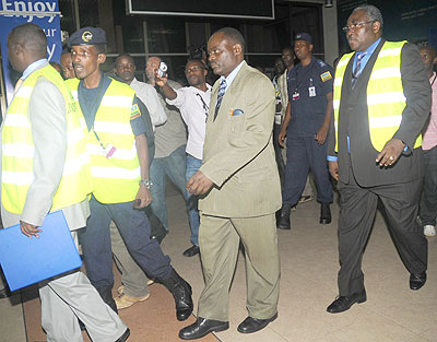 Jean Bosco Uwinkindi (C) on arrival at Kigali International Airport on Thursday. The New Times/File.