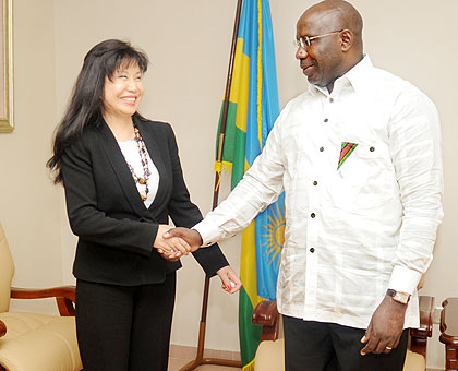 Prime Minister Pierre Damien Habumuremyi (L) with the ILDC Chairperson, Huan Shan. The Sunday Times/ John Mbanda.