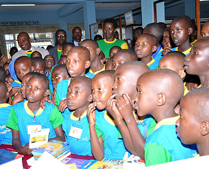 First Lady Jeannette Kagame (Centre background) with children at the Reading Day event held yesterday in Rubavu District.The New Times / Courtesy.