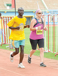 Some of the participants from last yearu2019s edition taking part in a warm up lap before the main event. The New Times/File.