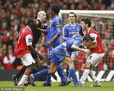 Hold on: Fabregas (right) grabs Lampard in the 2007 Carling Cup final. Net photo.