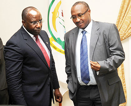 Prime Minister Pierre Damien Habumuremyi (L),  with the Minister for Cabinet Affairs, Protais Muson, after yesterdayu2019s Public Accountability Day session. The New Times / John Mbanda.