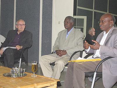 (L-R) Dr. Peter Stepan with the guest speakers, Thu00e9odore Simburudali and Ndoba Gasana during the debate. The Sunday Times / Linda Mbabazi.