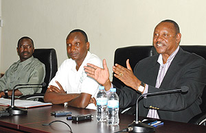 Police FC chairman Alphonse Katarebe seated next to Supt. Eric Kayiranga and Assistant Commissioner of Police Jean Bosco Kabeera. The New Times / B. Mugabe.