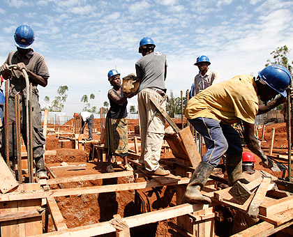 Workers at a construction site. The New Times / File.