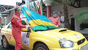 Ready to fly; Davite Giancarlo with his navigator and wife Slyvia Vindevogel after finishing fourth in the Zimbabwe Toyota Rally in March. The New Times / File.