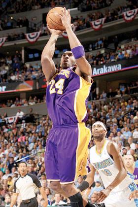 Kobe Bryant of the Los Angeles Lakers takes a shot against the Denver Nuggets in Game Four. Net photo.