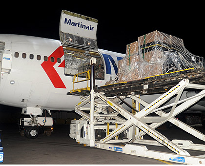 The consignment of vaccines being unloaded from a cargo plane at Kigali International airport on the weekend. The New Times / John Mbanda.