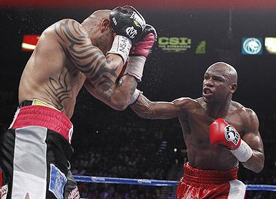 Floyd Mayweather (right) has two of the six top-selling PPV fights. Net photo.