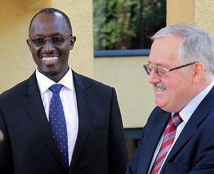 Andrew Rugege,( L), Director, International Telecommunication Union (ITU) regional office for Africa, with Deputy Director for Bureau of development and Telecommunication, Yuri Grin. The Sunday Times / T. Kisambira.