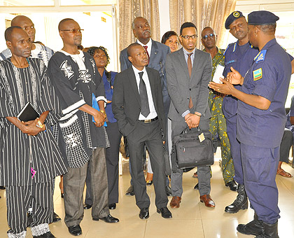 ACP Dr Daniel Nyamwasa (extreme right) Director of Kacyiru Police Hospital, briefing visiting police officers from Benin and Burkina Faso at Isange One Stop Centre yesterday.The New Times / Courtesy.