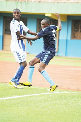 Meddie Kagere (right) has refused to confirm or deny whether he will sign a new deal with Police in the wake of the club;s failure to win the league. The New Times/File.