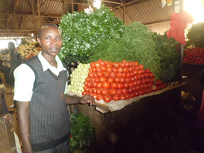 A vendor selling agriculture produce. Increasing penetration of e-Soko will give a major boost to smallholder farmers.. The New Times / File.