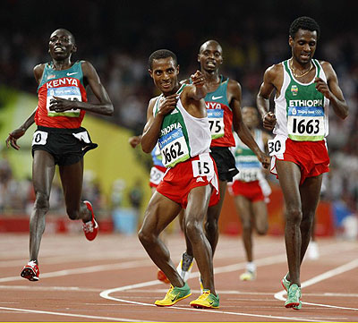 Kenenisa Bekele (C) smashed Olympic Record in 10K wins the 2nd Gold. Net photo.