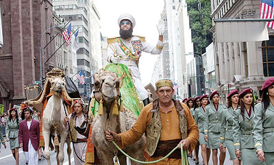 Parade being led through New York in u201cThe Dictatoru201d. Net photo.