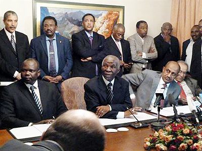 Former President Thabo Mbeki (seated centre) with negotiating teams of the two Sudans recently. Net Photo.