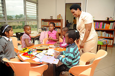 Children reading books in a library. The e-Libraries will come in handy. The New Times / File.