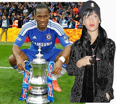 Man of the moment. Didier Drogba celebrates with the trophy.