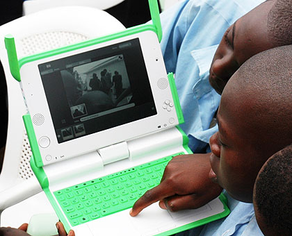 Pupils using a laptop. OLPC global chief has been in the country. The New Times / File.