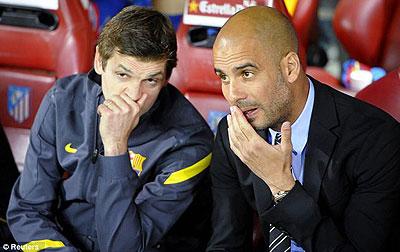 Looks like Tito Vilanova (left), who will take over from Pep Guardiola, has already picked up some handy tips. Net photo.