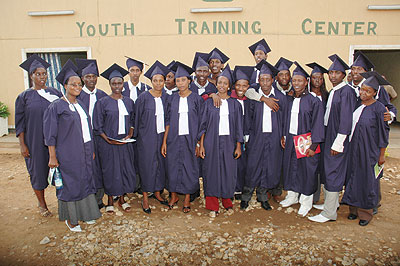 A group of graduates in a past. The New Times / F. Goodman.