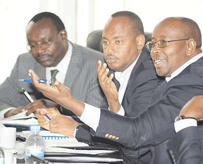 L-R: Ministers Francois Kanimba (Trade and Industry), Albert Nsengiyumva (Infrastructure) and James Musoni of Local Government, appear before the Parliamentary Standing Committee on Budget and Patrimony yesterday.  The New Times / John Mbanda.