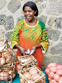 Mukankusi with well packaged Irish potatoes. The New Times / Doreen Umutesi.