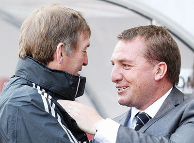 Brendan Rodgers (R) replaces Kenny Dalglish (L) as Liverpool boss. Net photo.