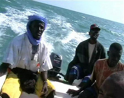 Pirates on a speed boat near the enclave of Eyl, Somalia in this framegrab made from a November 24, 2008 TV footage. Net photo.