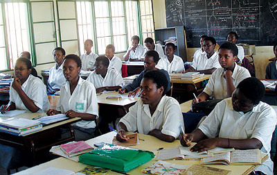 Secondary school students attentively partake class. The New Time / File photo.