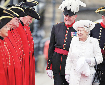 A jubilant looking Queen Elizabeth II greets the Chelsea Pensioners before she boards The Spirit of Chartwell ahead of the Jubilee celebrations. It was a day at the races for the royal family as Diamond Jubilee celebrations kicked off, honoring the 60 yea