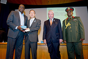 L-R: Rwandau2019s Permanent Representative to the UN, Ambassador Eugene-Richard Gasana; UN Secretary General, Ban Ki-Moon; Under-Secretary-General of Peacekeeping Operations, Hervu00e9 Ladsous; and Rwandau2019s Military  Attachu00e9 to the UN, Col. Vincent Nyakarundi at 