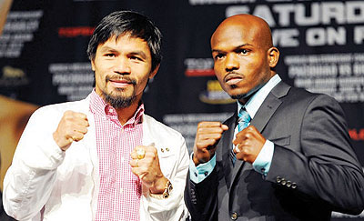 Pacquiao (L) will defend his WBO welterweight title against Bradley when the two meet in the ring Saturday night in Las Vegas.  Net photo.