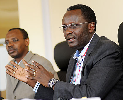 Prosecutor General Martin Ngoga (R) flanked by Inspector General of the Prosecution Jules Marius Ntete addresses the press yesterday. The New Times / John Mbanda.