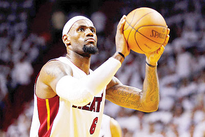 LeBron James shoots a free throw against the Boston Celtics. Net photo.